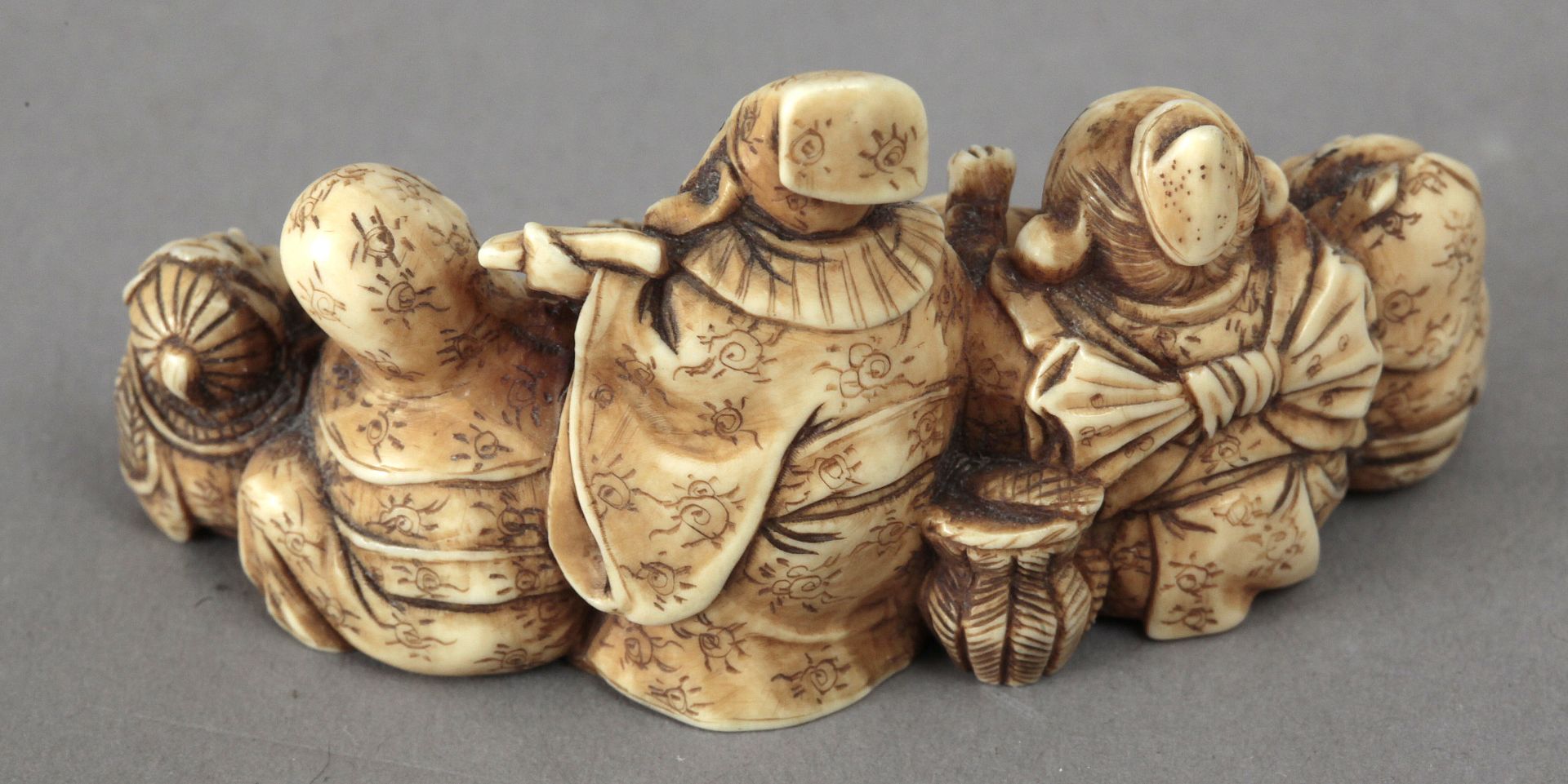 Late 19th century Japanese school. A carved ivory netsuke okimono