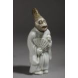 A 19th century Japanese netsuke in glazed porcelain