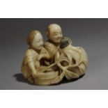 A Japanese netsuke circa 1860-1880 from Meiji period. Signed Masatami Con Kakihan