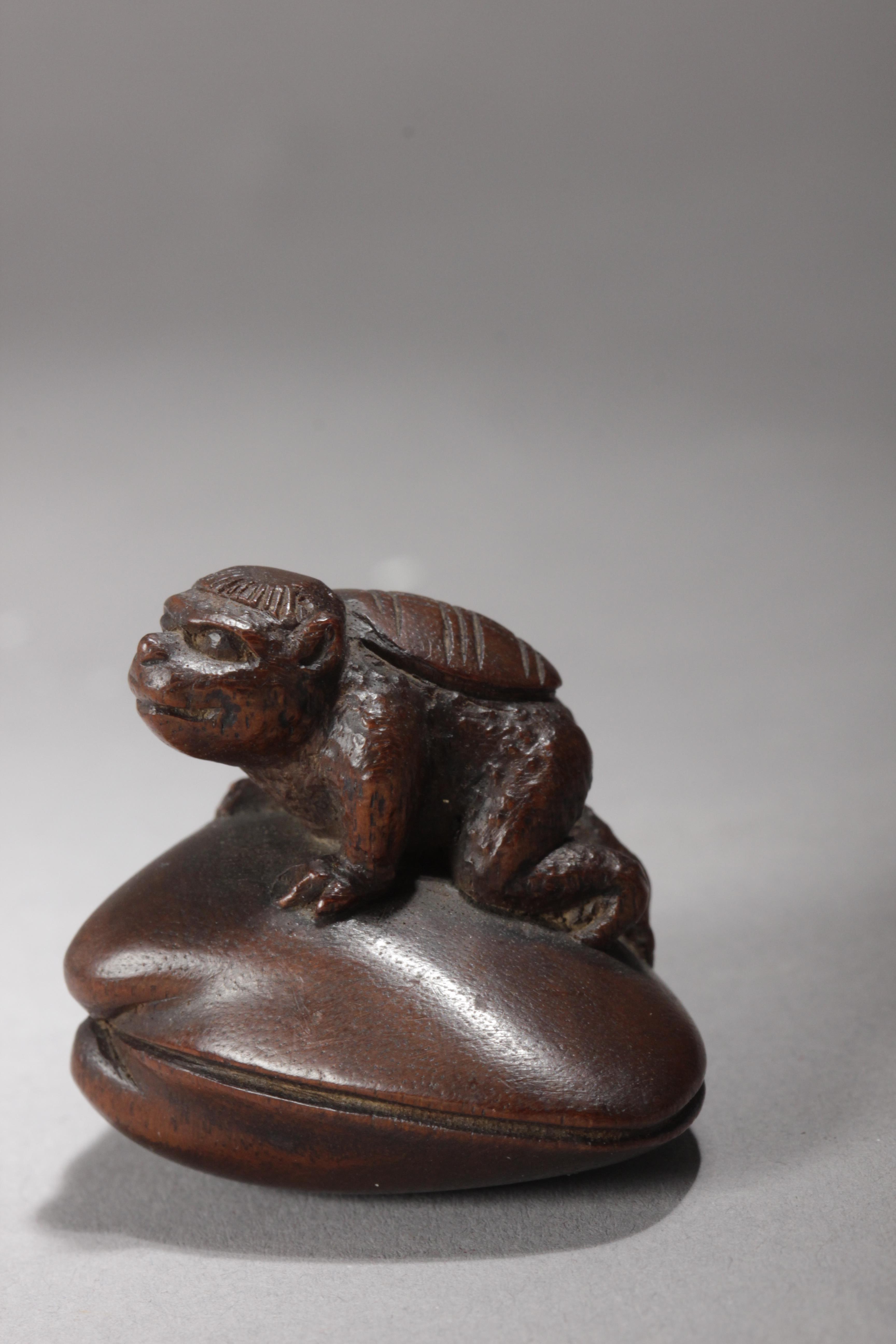 A 19th century Japanese netsuke. Signed Gyokokyu