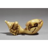 A 19th century Japanese netsuke. Signed Tomochika