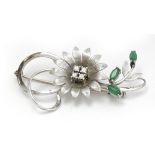 A diamond and chrysoprase flowery brooch circa 1960-1969 with an 18k. white gold setting