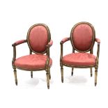 A pair of 20th century Louis XVI style armchairs