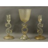 A pair of 20th century Italian candlesticks and a centrepiece in Murano glass