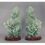20th century Chinese school. A pair of carved jade sculptures