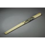 A late 19th century Japanese cigarette holder from Meiji period. In carved elephant ivory