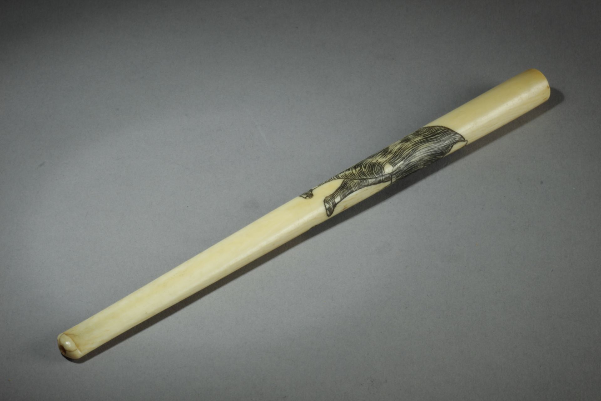 A late 19th century Japanese cigarette holder from Meiji period. In carved elephant ivory