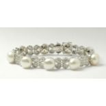 A freshwater pearls, diamonds and 18k. white gold bracelet