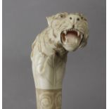 A first half of 20th century Anglo-Indian walking cane in carved ivory