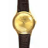 Cyma. 18k. yellow gold gentlemen watch with a leather strap