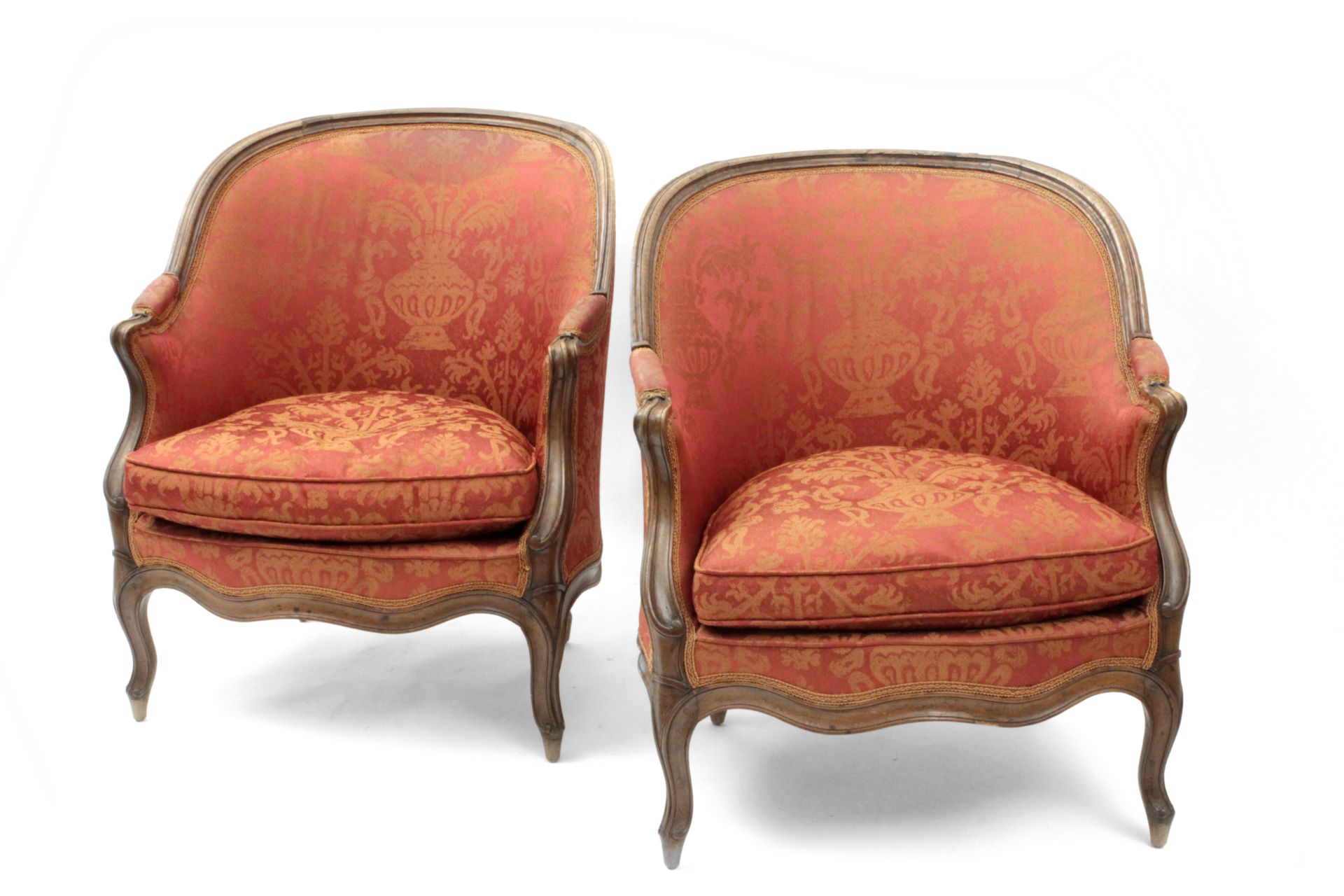 A pair of late 18th century Louis XV mahogany armchairs