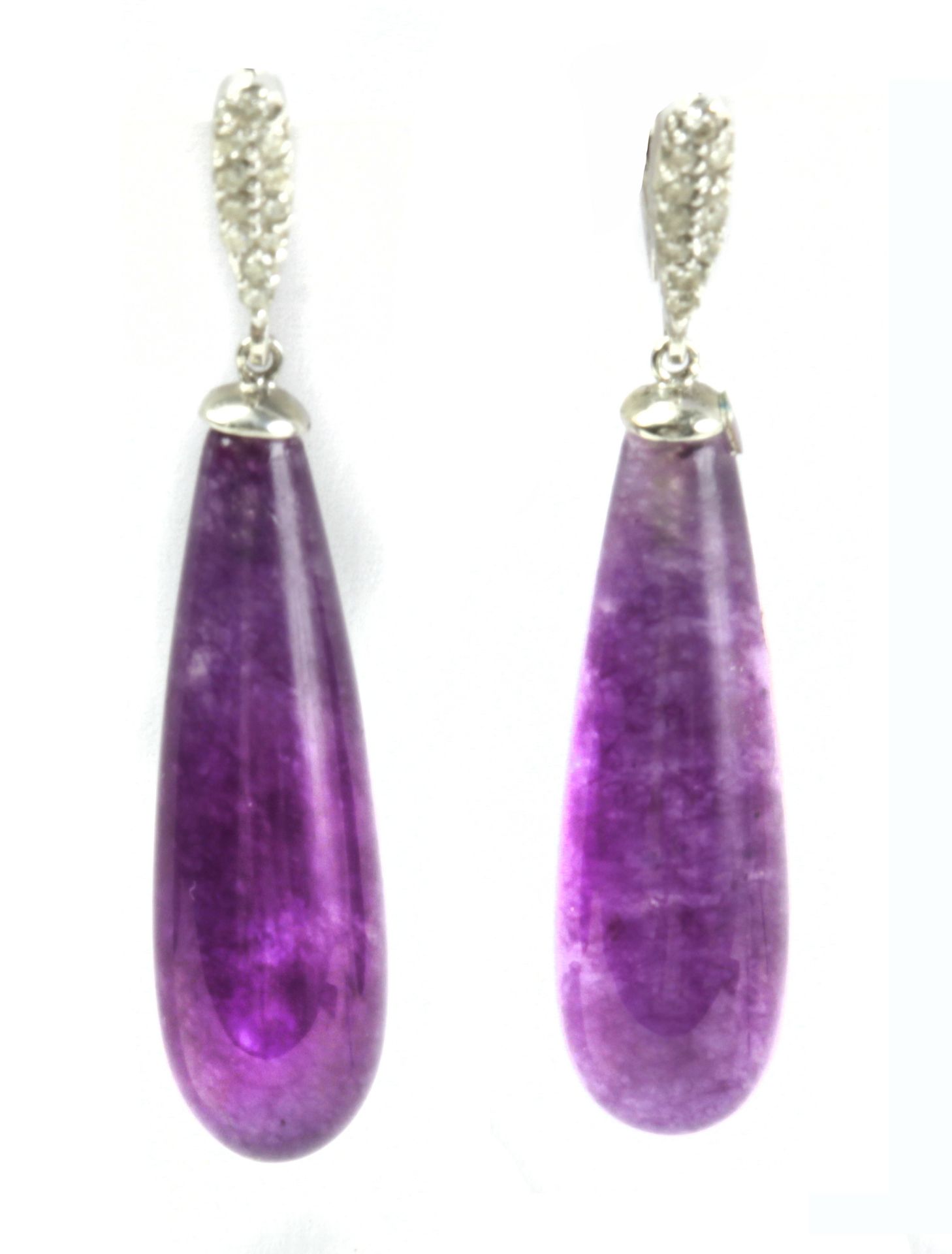 A pair of diamond earrings with an 18k. white gold setting and a dyed quartzite pendant