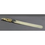 A 19th century Japanese paper knife from Meiji period. In carved ivory.