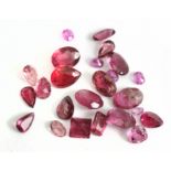 A collection of 24 loose Rubellite tourmalines