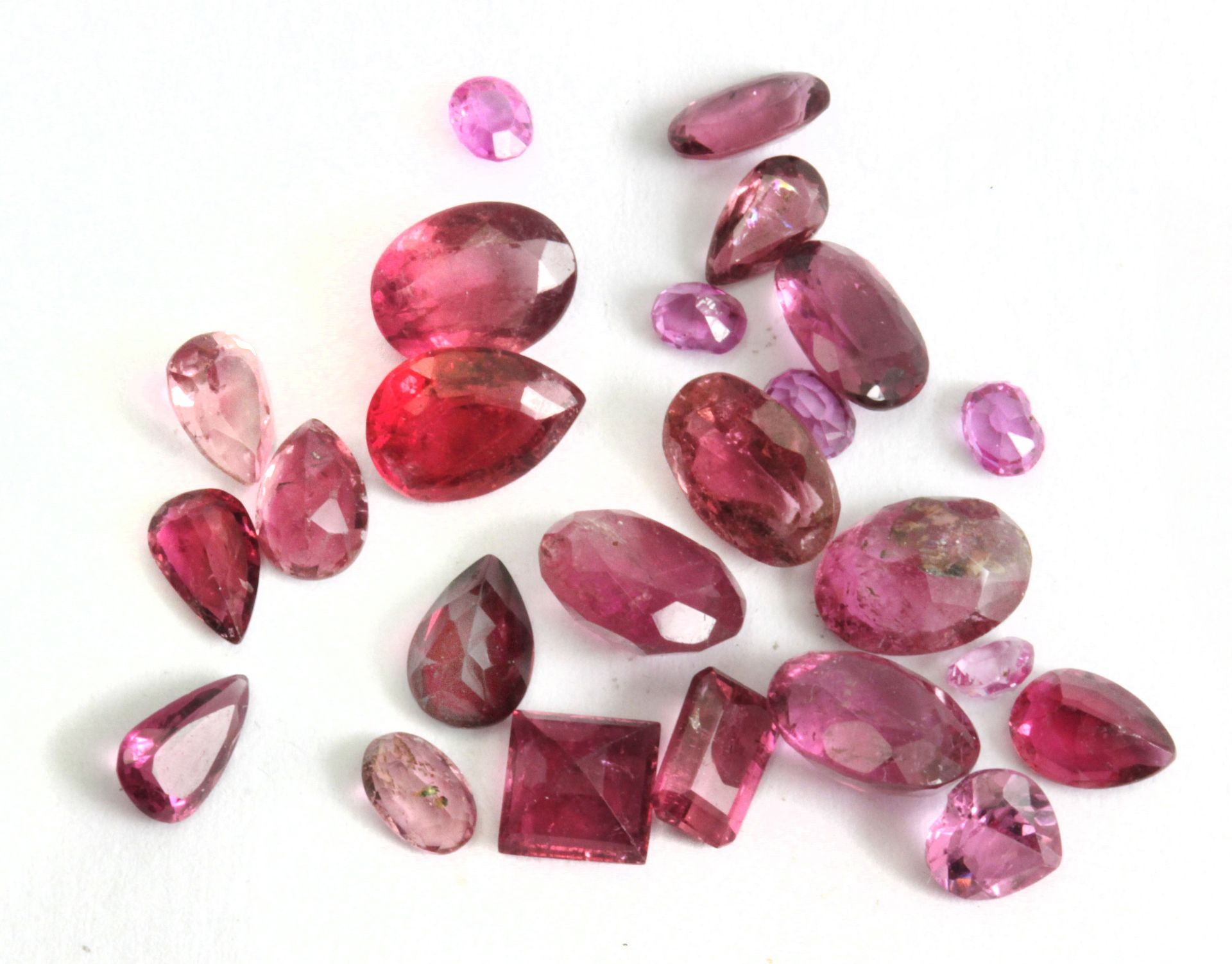 A collection of 24 loose Rubellite tourmalines