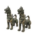 A pair of 20th century Cambodian Fu guardian lion sculptures in bronze