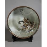 A 19th century Meiji plate in Satsuma porcelain