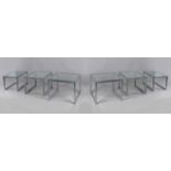 A set of six nest tables. With a chroming steel structure and glass tops