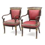 A pair of French Empire period mahogany armchairs
