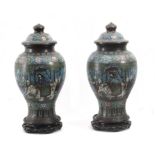 A pair of 20th century Japanese vases with its covers in bronze and cloisonné enamel