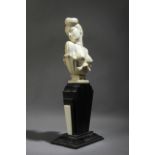 An Art-Déco bust of a lady circa 1930 in carved ivory and ebony