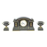 A late 19th century Napoleon III style mantel clock garnished with urns
