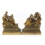 A pair of 19th century French andirons in gilt bronze
