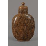 A 20th century Chinese snuff bottle in faux bois porcelain