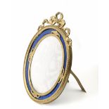 A 19th century Empire frame in gilt bronze and guilloché enamel