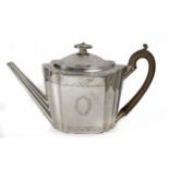 An early 20th century Empire style English teapot in silver and bakelite