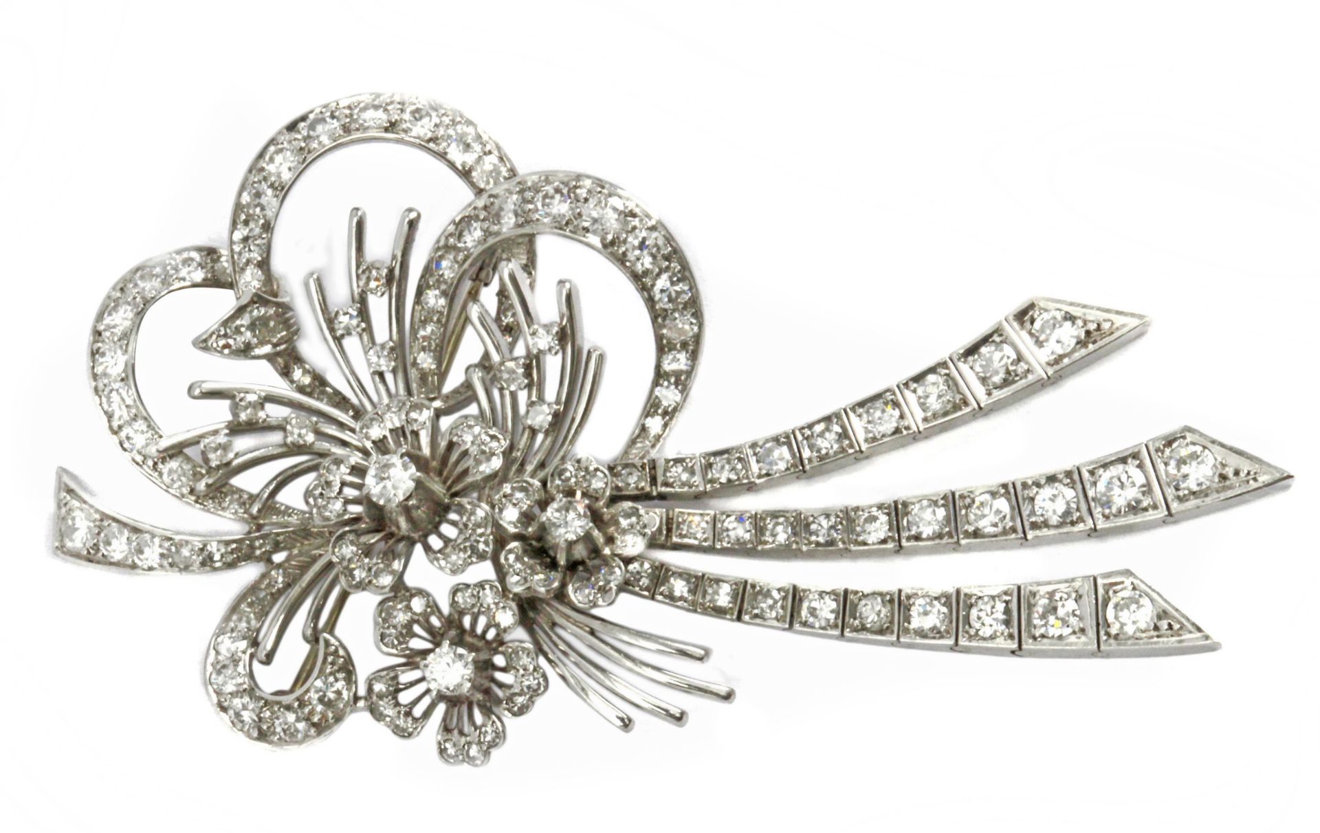 A diamond and 18k. white gold flowery brooch circa 1950