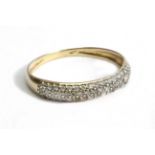 A diamond pave half eternity ring