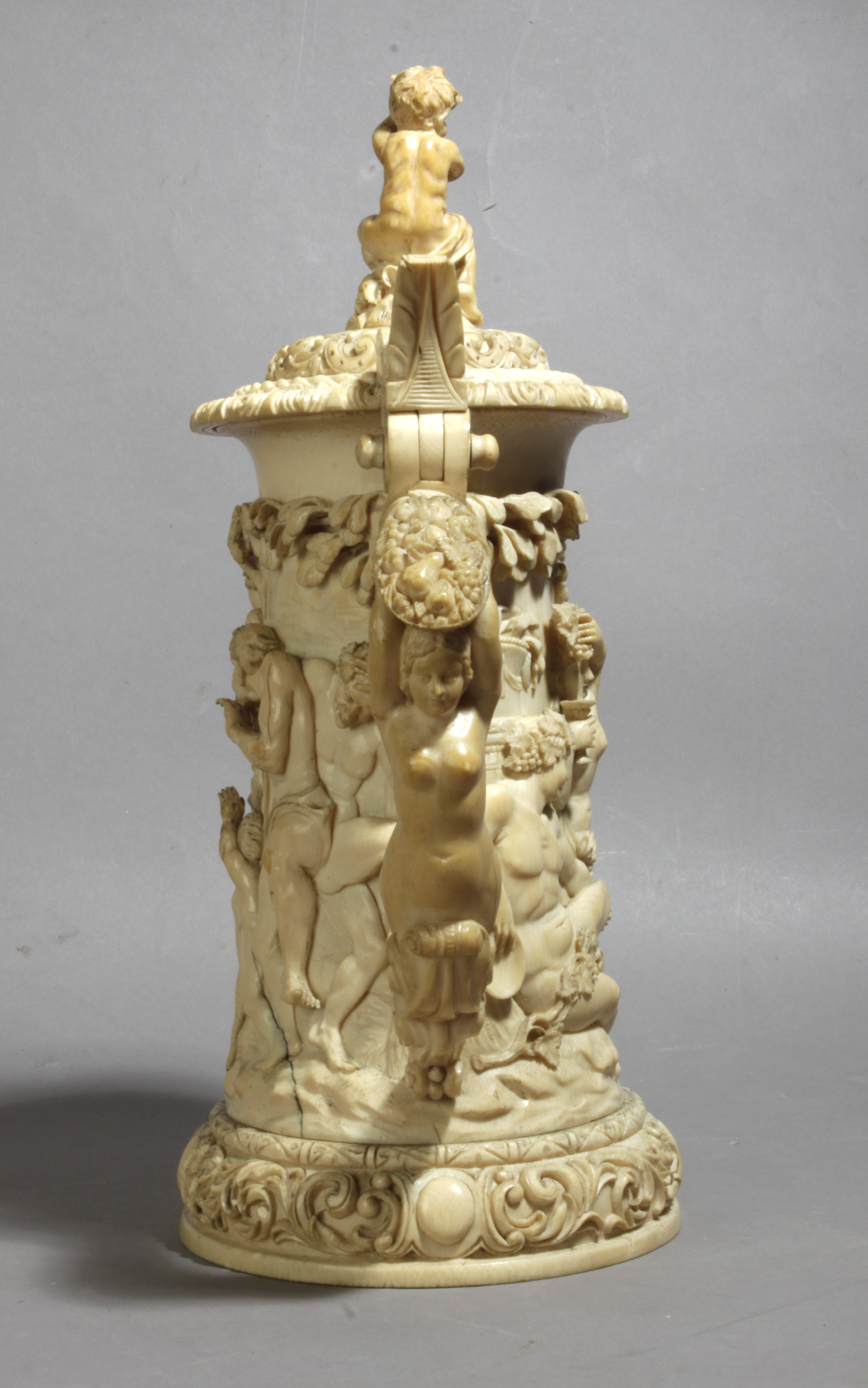 A 19th century German tankard in carved ivory depicting a Bacchanalia - Image 4 of 5