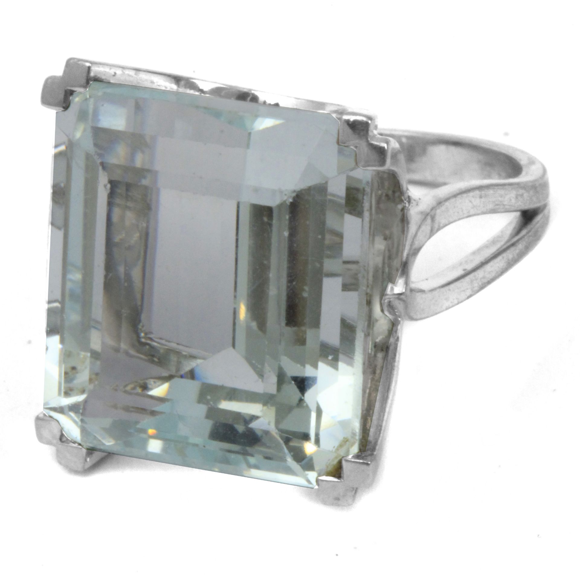 A 37 ct. emerald cut aquamarine ring with an 18k. white gold setting