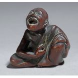 A 19th century Japanese netsuke from Meiji period. Signed Hokei