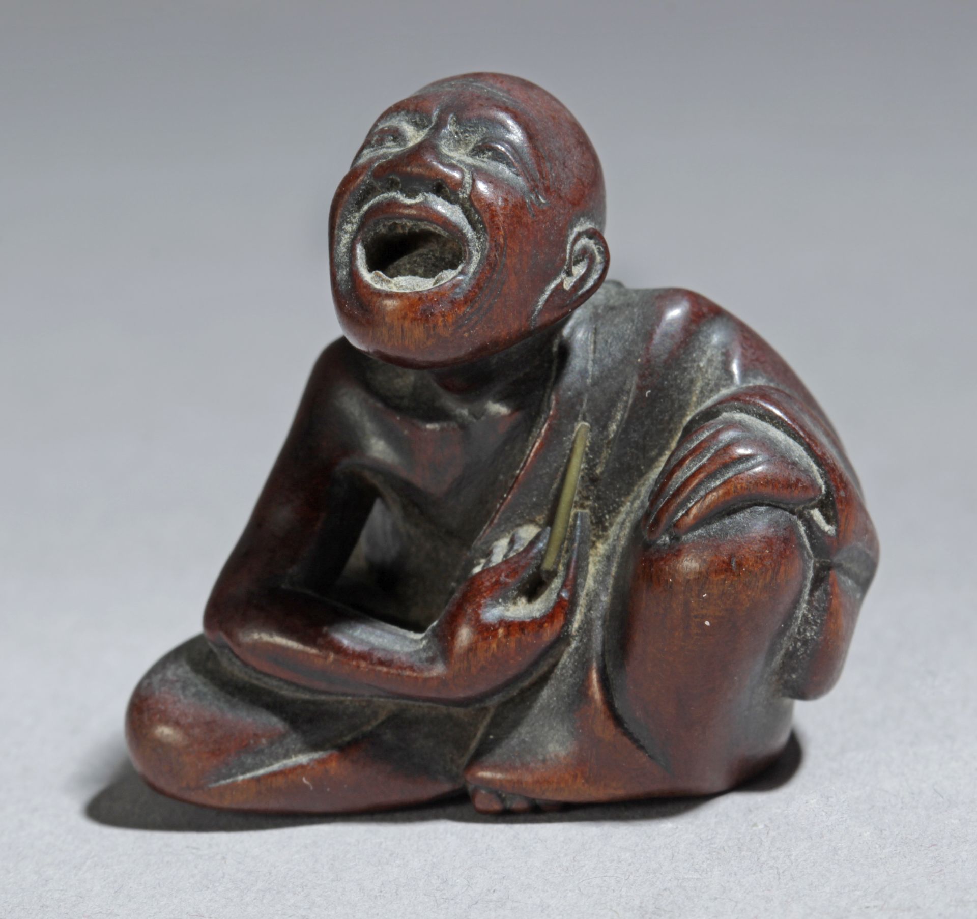 A 19th century Japanese netsuke from Meiji period. Signed Hokei