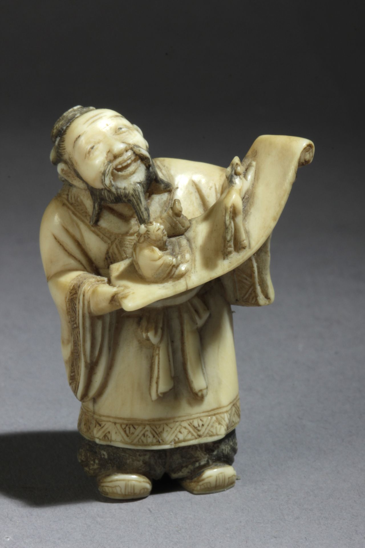 A late 19th century Japanese netsuke from Meiji period. Signed Gyokkosai