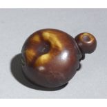 A 19th century Ganbun Mebun style Japanese netsuke from Meiji period, Signed Gyokuzan