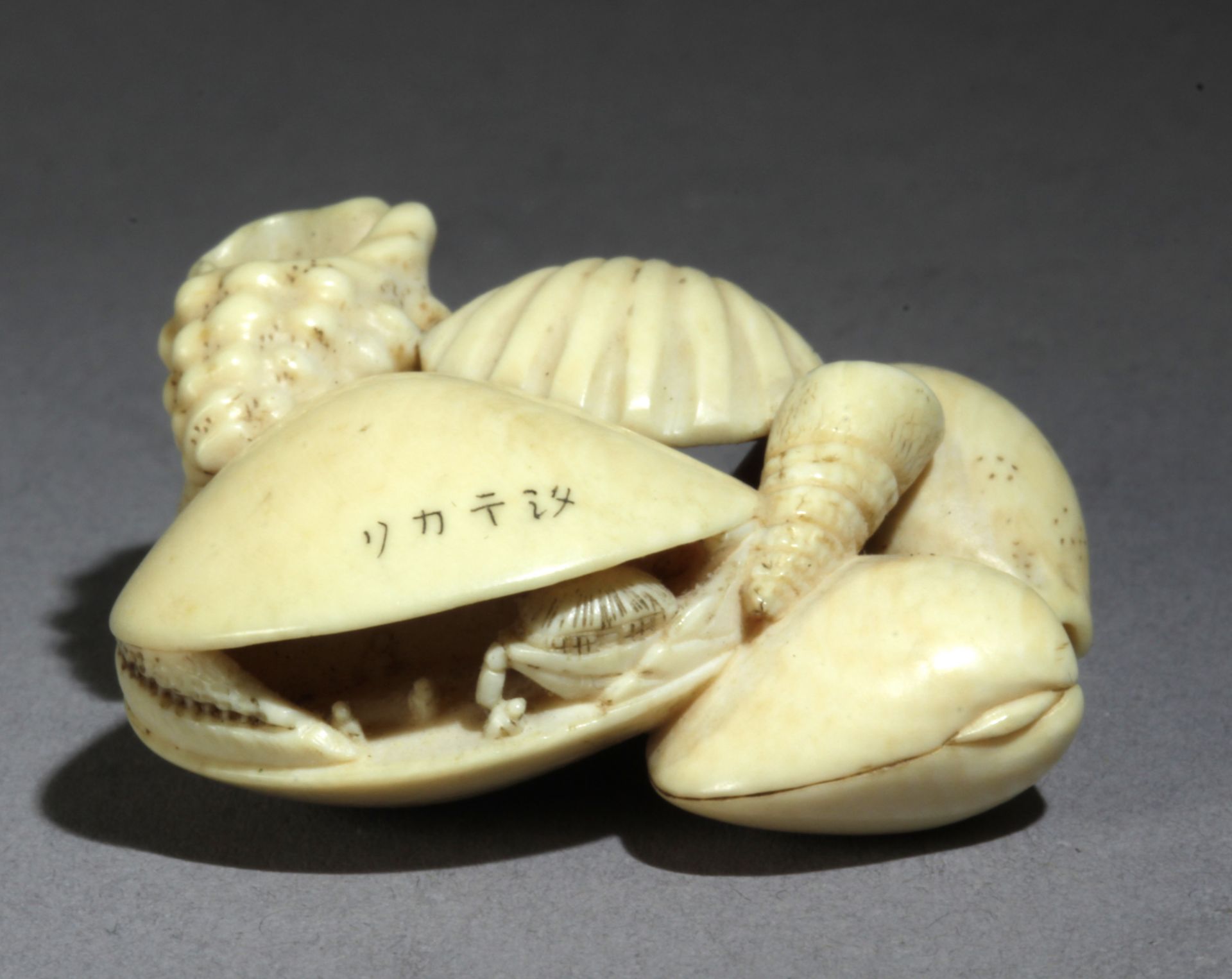 A 19th century Japanese netsuke from Meiji period. Signed Mokazu - Image 2 of 7