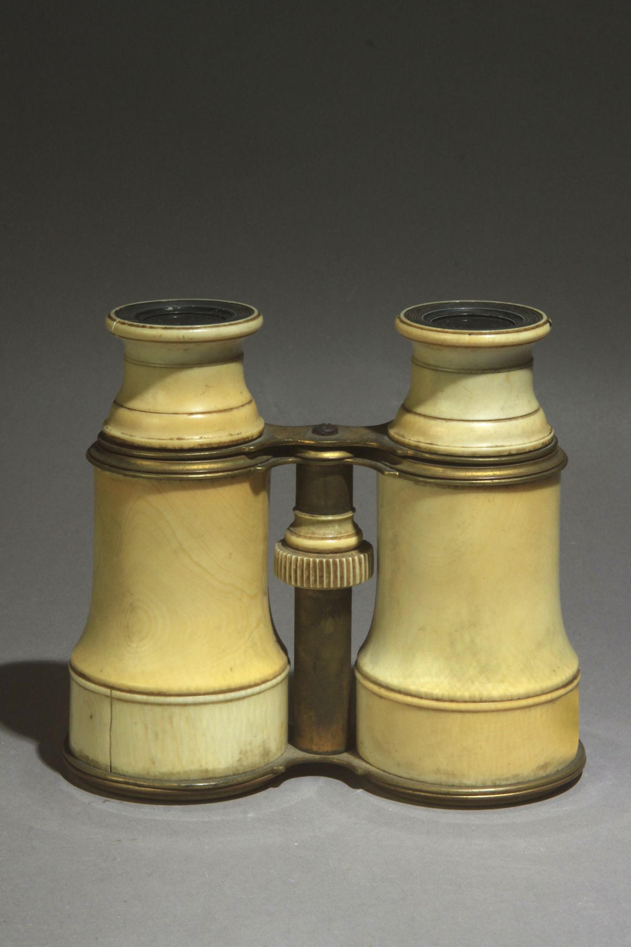 A 19th century carved elephant tusk binoculars