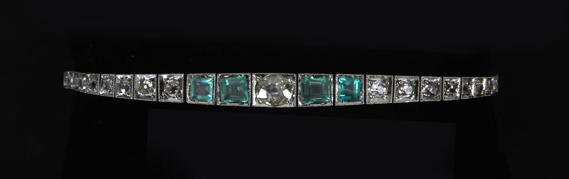 An Art-Déco diamonds and paste emeralds bracelet circa 1920