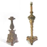 A pair of carved and polychromed wood torch stands from 19th and 20th centuries