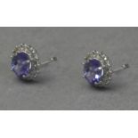A pair of diamond and kyanite cluster earrings