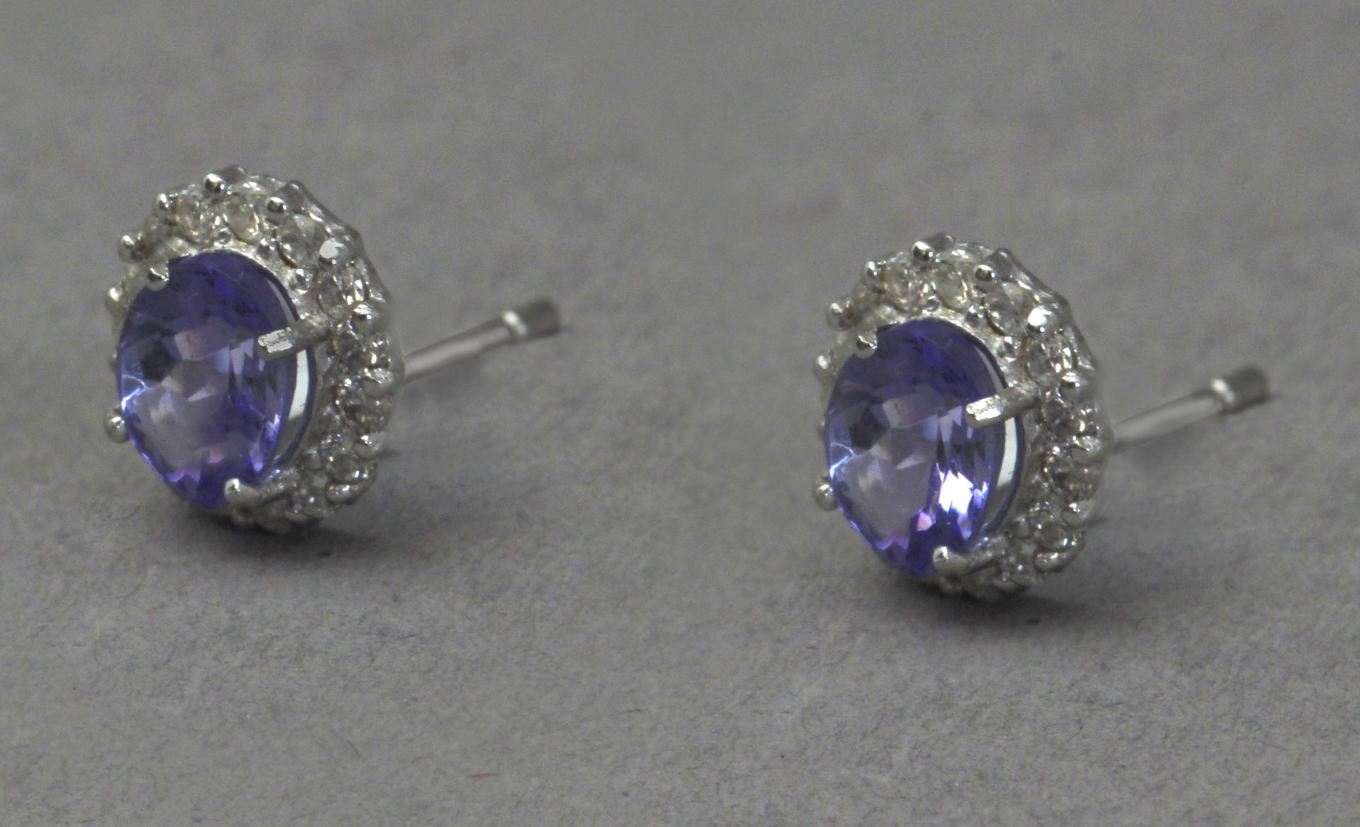 A pair of diamond and kyanite cluster earrings