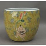 A 19th century Chinese cache pot in Famille Rose porcelain