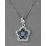 A kyanite and diamond pendant with an 18k. white gold chain