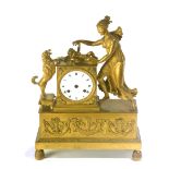 A 19th century Empire period gilt bronze mantel clock