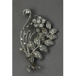 A mid 20th century diamond and platinum flowery brooch