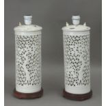 A pair of 19th century Chinese table lamps in blanc de Chine porcelain