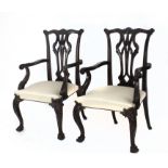 A pair of Chippendale style mahogany armchairs, England, 19th century